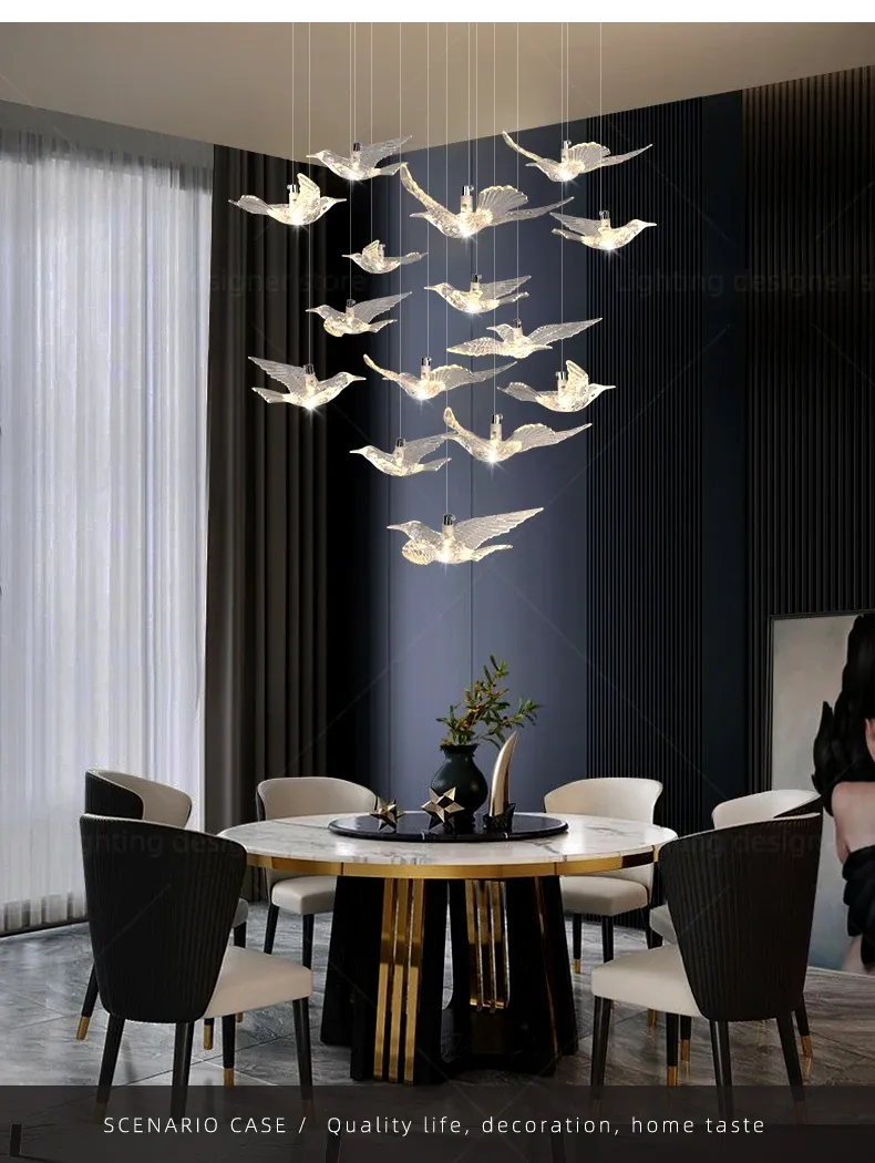 מנורת ציפורים מעוצבת מעל שולחן עגול בחדר אוכל אלגנטי