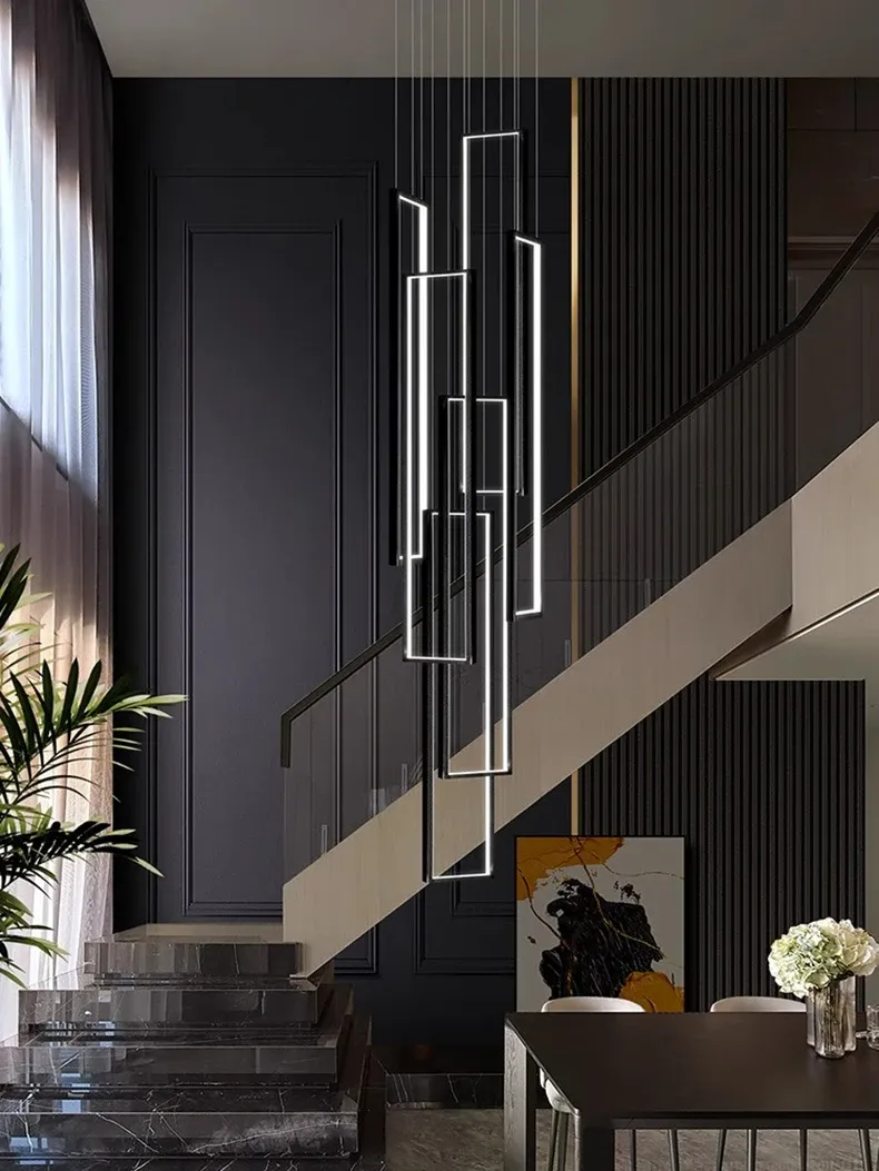 מנורת תלייה לבנה ליד גרם מדרגות כהה