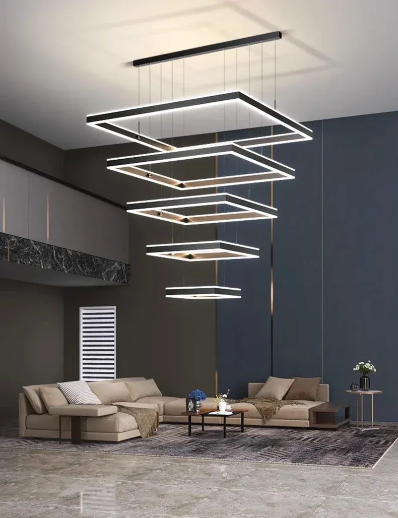 מנורת תלייה מעל סלון מרווח עם ספות בז'