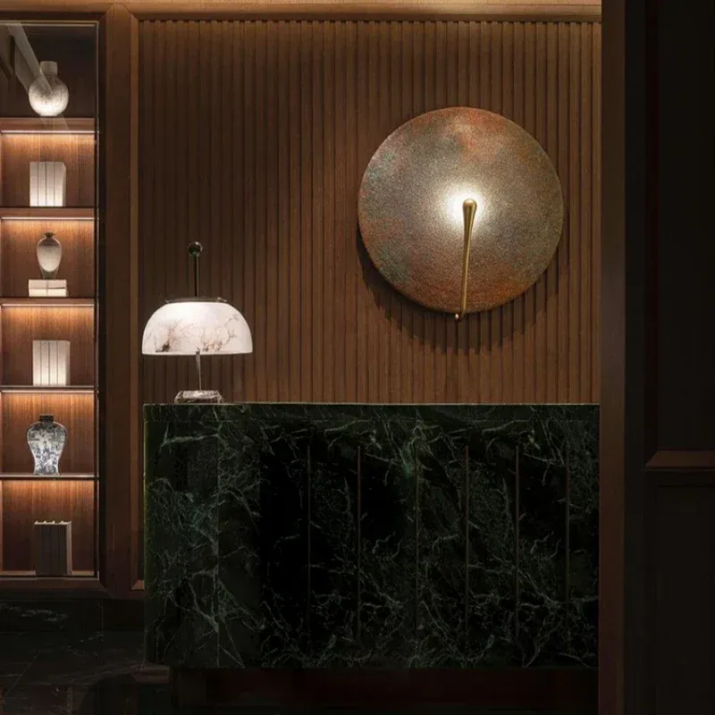 מנורת קיר עגולה מינימליסטית מפלדת אל חלד