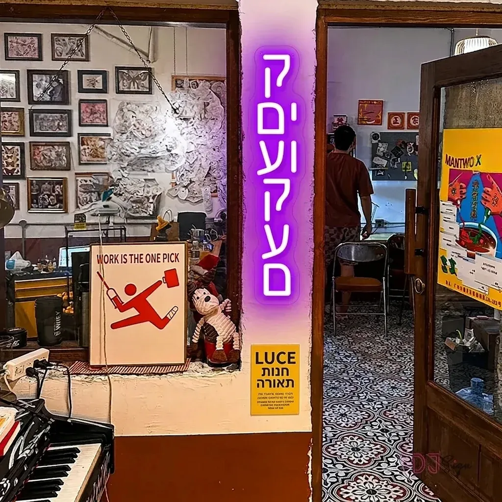 שלט ניאון לד סגול לסטודיו קעקועים