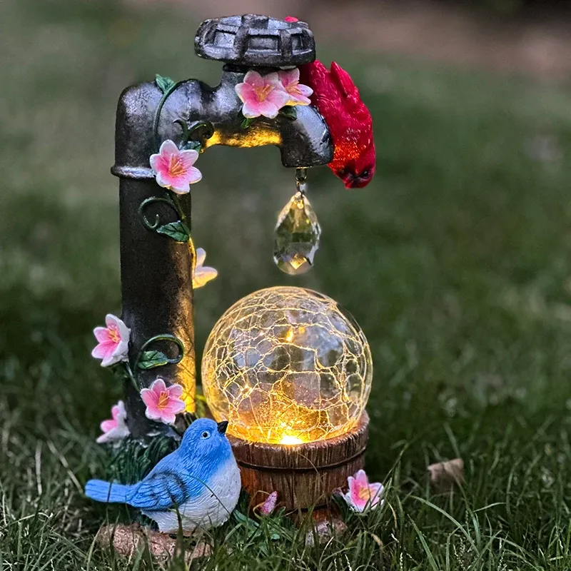 פסל קרדינל סולארי עם כדור אור לגינה